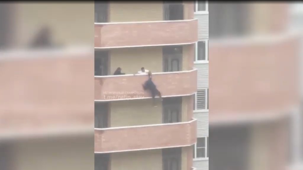 Man jumping from balcony filmed